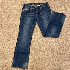 Cowgirl tough bootcut jeans.